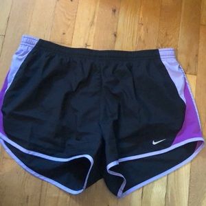 Black nike shorts with purple accents
